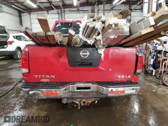 2005 Nissan Titan SE z VIN 1N6AA06BX5N502595, wystawiony jako Copart lot #85888184 z przebiegiem 231 851 mil mil oraz Nie do naprawy • Non repairable. Historia ofert i sprzedaży dostępna na DreamBid. Obrazek 6.