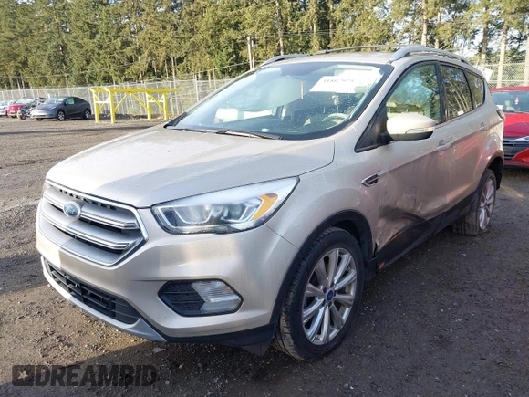 2017 Ford Escape Titanium with VIN 1FMCU0JD0HUB79739, listed as a IAAI auction lot 41807975 with 121,902 mi miles. Bid and sale history available at carsss.com. Image 2.