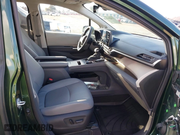 2024 Toyota Sienna XLE with VIN 5TDJSKFC7RS135935, listed as a IAAI auction lot 41409630 with 5,477 mi miles and . Bid and sale history available at DreamBid. Image 5.