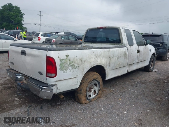 1998 Ford F-150 with VIN 1FTZX1763WKC13105, listed as a IAAI auction lot 42546968 with 181,258 mi miles and . Bid and sale history available at DreamBid. Image 4.