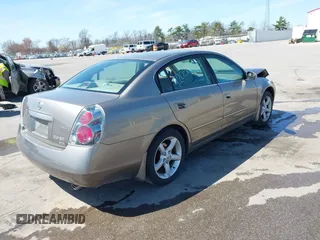2005 Nissan Altima SE z VIN 1N4BL11D65C148642, wystawiony jako IAAI lot #42056330 z przebiegiem 81 328 mil mil oraz . Historia ofert i sprzedaży dostępna na DreamBid. Obrazek 4.