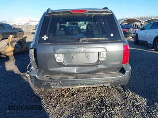 2003 Honda Pilot EX with VIN 2HKYF18433H614451, listed as a IAAI auction lot 41561972 with 199,394 mi miles. Bid and sale history available at carsss.com. Image 17.