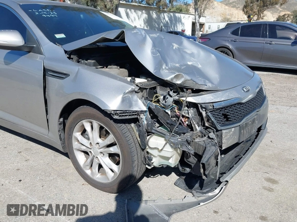 2013 Kia Optima EX with VIN 5XXGN4A7XDG128799, listed as a IAAI auction lot 41631612 with 191,124 mi miles. Bid and sale history available at carsss.com. Image 6.