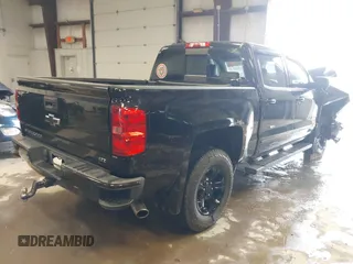 2015 Chevrolet Silverado 1500 LTZ with VIN 3GCUKSEJ0FG365663, listed as a IAAI auction lot 41553902 with 123,266 mi miles. Bid and sale history available at carsss.com. Image 4.