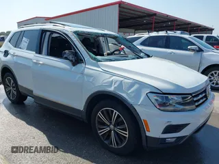 2018 Volkswagen Tiguan SEL z VIN 3VV3B7AX5JM091021, wystawiony jako IAAI lot #42392698 z przebiegiem 107 595 mil mil oraz . Historia ofert i sprzedaży dostępna na DreamBid. Obrazek 12.