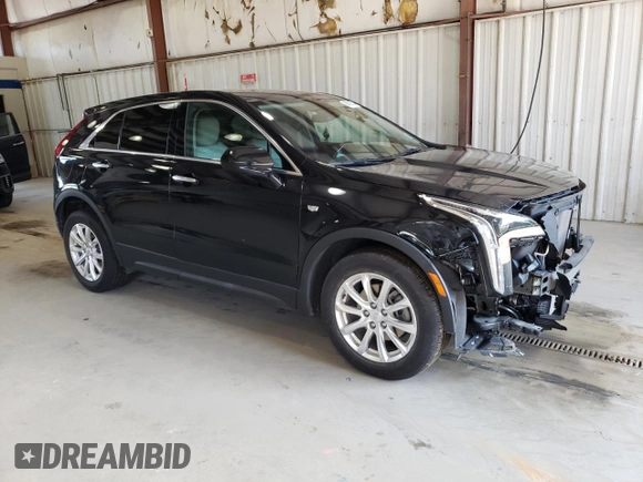 2020 Cadillac XT4 AWD Luxury with VIN 1GYFZBR42LF081550, listed as a Copart auction lot 68891524 with 27,985 mi miles and Salvage Title. Bid and sale history available at carsss.com. Image 4.
