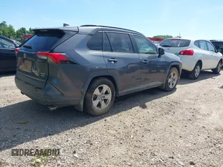2021 Toyota RAV4 XLE with VIN 2T3P1RFV1MC214257, listed as a IAAI auction lot 42297014 with Not provided miles and . Bid and sale history available at DreamBid. Image 4.