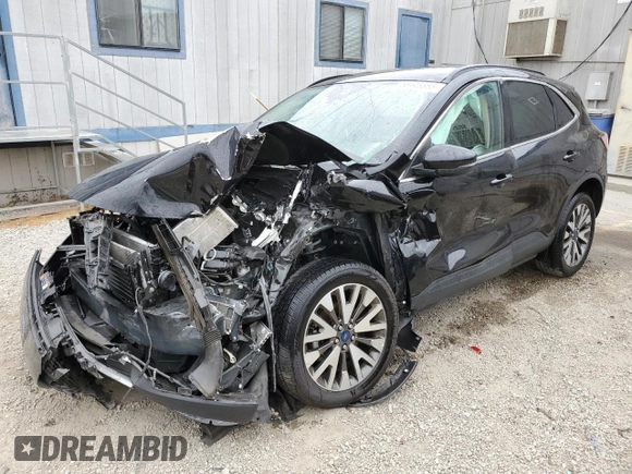 2020 Ford Escape Titanium with VIN 1FMCU9J97LUA59056, listed as a Copart auction lot 58445885 with Not provided miles and Salvage title. Bid and sale history available at DreamBid. Image 1.