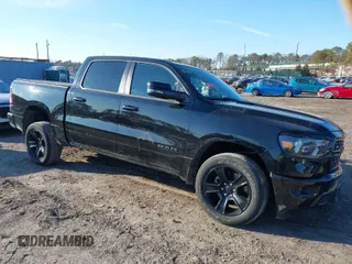 2023 Ram 1500 Big Horn with VIN 1C6SRFFT1PN660751, listed as a IAAI auction lot 41692496 with 30,215 mi miles and . Bid and sale history available at DreamBid. Image 1.
