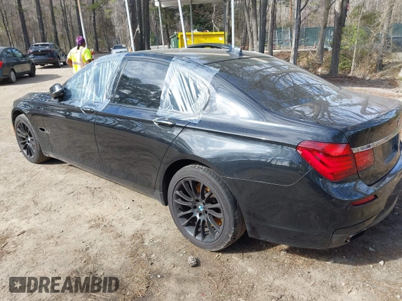 2013 BMW 7 Series 750i xDrive with VIN WBAYB6C59DD223947, listed as a IAAI auction lot 41585255 with Not provided miles and . Bid and sale history available at DreamBid. Image 3.