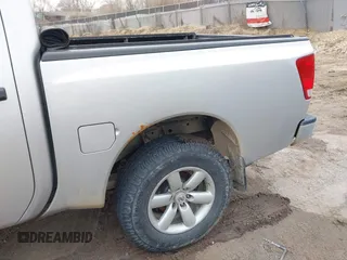 2012 Nissan Titan S with VIN 1N6AA0EJXCN310874, listed as a IAAI auction lot 42022787 with 162,317 mi miles. Bid and sale history available at carsss.com. Image 6.