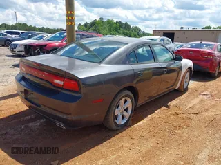 2014 Dodge Charger SE z VIN 2C3CDXBG5EH315467, wystawiony jako IAAI lot #42273742 z przebiegiem 153 493 mil mil oraz . Historia ofert i sprzedaży dostępna na DreamBid. Obrazek 4.