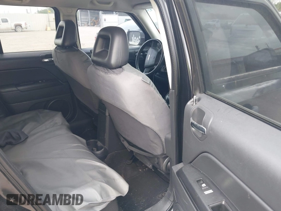 2009 Jeep Patriot Sport with VIN 1J8FT28B29D165484, listed as a IAAI auction lot 41939764 with 116,743 mi miles. Bid and sale history available at carsss.com. Image 8.