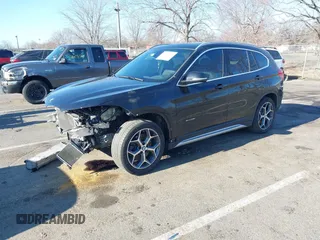 2018 BMW X1 xDrive28i with VIN WBXHT3C36J5F91110, listed as a IAAI auction lot 41757293 with 80,327 mi miles. Bid and sale history available at carsss.com. Image 2.
