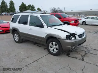 2003 Mazda Tribute ES with VIN 4F2CZ06163KM25315, listed as a IAAI auction lot 41567537 with 105,529 mi miles. Bid and sale history available at carsss.com. Image 1.