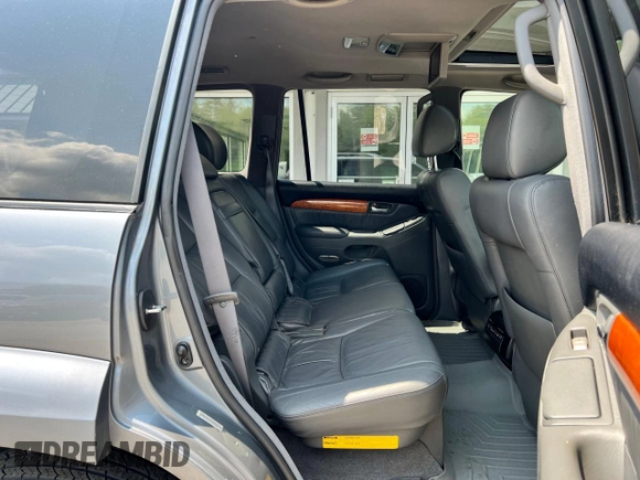 2004 Lexus GX 470 z VIN JTJBT20X940060144, wystawiony jako Copart lot #60893715 z przebiegiem 303 468 mil mil oraz Czysty tytuł • Clean title. Historia ofert i sprzedaży dostępna na DreamBid. Obrazek 6.