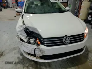 2013 Volkswagen Passat Wolfsburg Edition z VIN 1VWAH7A3XDC147667, wystawiony jako Copart lot #56549415 z przebiegiem 76 644 mil mil oraz Szkoda całkowita • Salvage title. Historia ofert i sprzedaży dostępna na DreamBid. Obrazek 13.