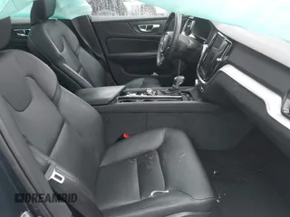2019 Volvo S60 Momentum with VIN 7JRA22TK2KG013593, listed as a IAAI auction lot 41560933 with 49,619 mi miles. Bid and sale history available at carsss.com. Image 5.