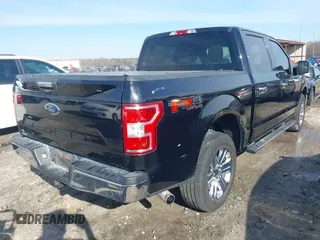 2018 Ford F-150 XL with VIN 1FTEW1E59JFB63307, listed as a IAAI auction lot 41652067 with 174,097 mi miles. Bid and sale history available at carsss.com. Image 4.