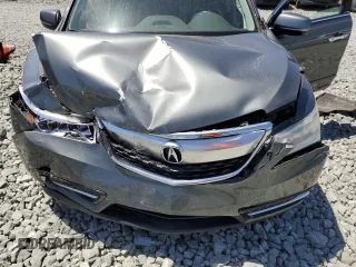 2014 Acura MDX Technology z VIN 5FRYD4H4XEB030670, wystawiony jako Copart lot #54409925 z przebiegiem Nie podano mil oraz Szkoda całkowita • Salvage title. Historia ofert i sprzedaży dostępna na DreamBid. Obrazek 12.