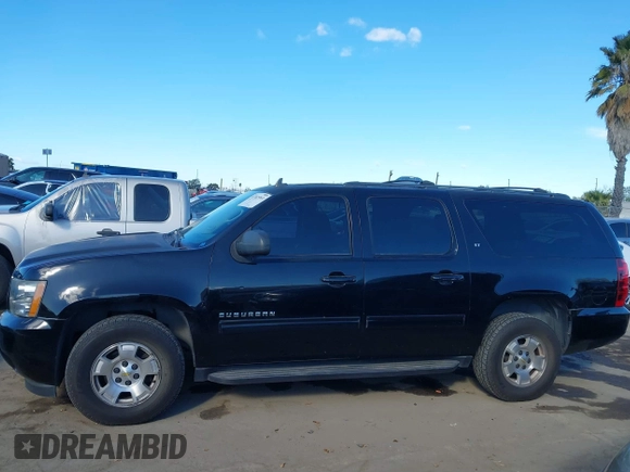 2014 Chevrolet Suburban LT with VIN 1GNSCJE08ER240230, listed as a IAAI auction lot 41702593 with 140,190 mi miles. Bid and sale history available at carsss.com. Image 14.