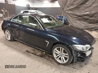 2015 BMW 4 Series 428i xDrive with VIN WBA3T1C59FP820155, listed as a IAAI auction lot 41077810 with 78,029 mi miles and . Bid and sale history available at carsss.com. Image 1.