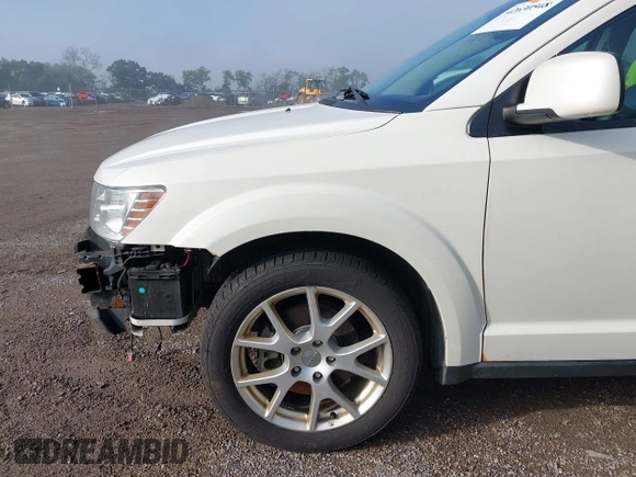 2013 Dodge Journey Crew with VIN 3C4PDCDG0DT591533, listed as a IAAI auction lot 42630548 with 164,961 mi miles and . Bid and sale history available at DreamBid. Image 18.