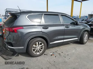2020 Hyundai Santa Fe SE with VIN 5NMS23AD7LH254945, listed as a IAAI auction lot 41457289 with 58,527 mi miles. Bid and sale history available at carsss.com. Image 4.