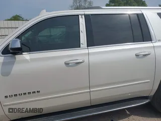 2015 Chevrolet Suburban LTZ with VIN 1GNSCKKC5FR740352, listed as a IAAI auction lot 39075234 with 112,945 mi miles and . Bid and sale history available at DreamBid. Image 15.