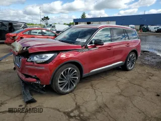 2020 Lincoln Aviator Reserve z VIN 5LM5J7XC5LGL26697, wystawiony jako Copart lot #57570355 z przebiegiem 64 692 mil mil oraz Czysty tytuł • Clean title. Historia ofert i sprzedaży dostępna na DreamBid. Obrazek 1.