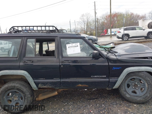 1998 Jeep Cherokee Sport z VIN 1J4FJ68S7WL264849, wystawiony jako IAAI lot #41931068 z przebiegiem Nie podano mil oraz . Historia ofert i sprzedaży dostępna na DreamBid. Obrazek 13.