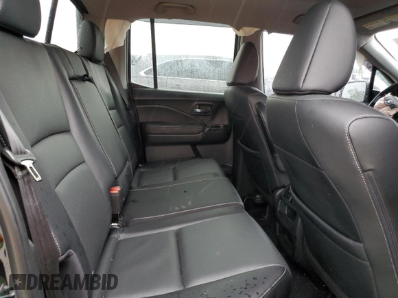 2023 Honda Ridgeline RTL with VIN 5FPYK3F51PB067811, listed as a Copart auction lot 56795995 with 21,500 mi miles and Salvage title. Bid and sale history available at DreamBid. Image 10.