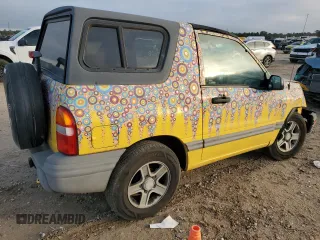 2003 Chevrolet Tracker z VIN 2CNBE18C136928311, wystawiony jako Copart lot #84463154 z przebiegiem 118 195 mil mil oraz Szkoda całkowita • Salvage title. Historia ofert i sprzedaży dostępna na DreamBid. Obrazek 3.