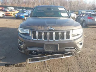 2015 Jeep Grand Cherokee Overland with VIN 1C4RJFCT3FC725239, listed as a IAAI auction lot 41779555 with 100,837 mi miles. Bid and sale history available at carsss.com. Image 6.
