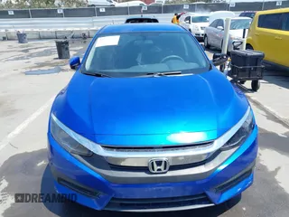 2017 Honda Civic LX z VIN 2HGFC2F56HH516730, wystawiony jako IAAI lot #42130963 z przebiegiem 119 236 mil mil oraz . Historia ofert i sprzedaży dostępna na DreamBid. Obrazek 12.