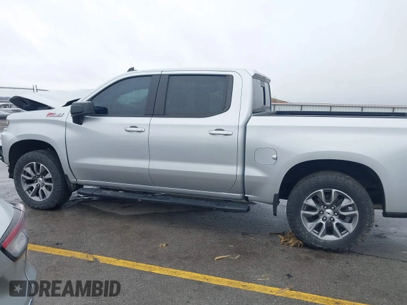 2021 Chevrolet Silverado 1500 RST with VIN 1GCUYEEDXMZ188935, listed as a IAAI auction lot 41733944 with 86,888 mi miles and . Bid and sale history available at DreamBid. Image 14.