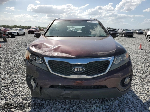 2012 Kia Sorento EX с VIN 5XYKU3A69CG248327, выставлен на аукционе Copart как лот 52068555 с пробегом 197 536 миль миль и Списание • Salvage title. История ставок и продаж доступна на DreamBid. Изображение 5.