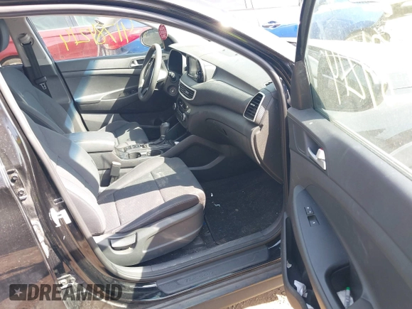 2019 Hyundai Tucson SE with VIN KM8J2CA4XKU852946, listed as a IAAI auction lot 41784214 with 120,857 mi miles. Bid and sale history available at carsss.com. Image 5.