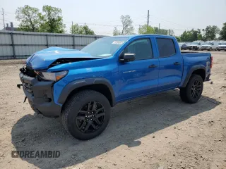 2023 Chevrolet Colorado 4WD Trail Boss z VIN 1GCPTEEK1P1126305, wystawiony jako Copart lot #53565985 z przebiegiem 12 254 mil mil oraz Szkoda całkowita • Salvage title. Historia ofert i sprzedaży dostępna na DreamBid. Obrazek 1.