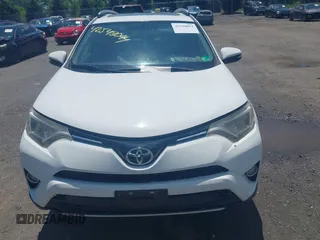 2016 Toyota RAV4 XLE with VIN JTMRFREV0GJ073114, listed as a IAAI auction lot 42548094 with 119,431 mi miles and . Bid and sale history available at DreamBid. Image 12.