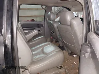 2003 Chevrolet Suburban LS z VIN 1GNFK16T93J211098, wystawiony jako IAAI lot #41494713 z przebiegiem 366 222 mil mil oraz . Historia ofert i sprzedaży dostępna na DreamBid. Obrazek 8.