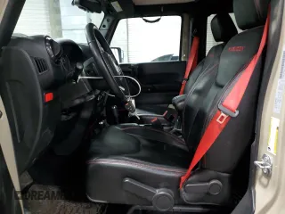 2018 Jeep Wrangler Unlimited Rubicon Recon z VIN 1C4HJWFG3JL830219, wystawiony jako Copart lot #47385325 z przebiegiem 121 679 mil mil oraz Szkoda całkowita • Salvage title. Historia ofert i sprzedaży dostępna na DreamBid. Obrazek 7.