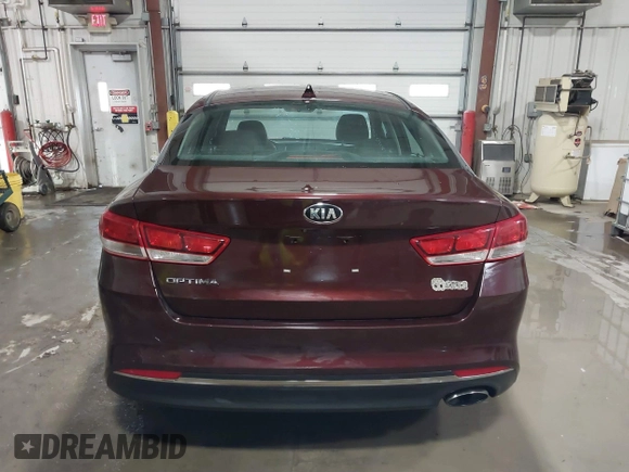 2016 Kia Optima LX with VIN 5XXGT4L3XGG073744, listed as a IAAI auction lot 41586212 with 111,628 mi miles. Bid and sale history available at carsss.com. Image 16.