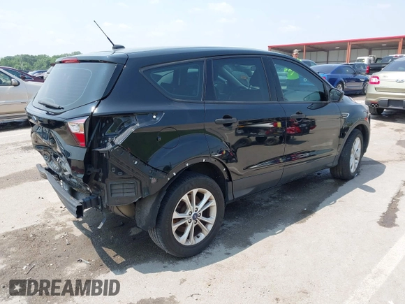 2018 Ford Escape S with VIN 1FMCU0F78JUB60610, listed as a IAAI auction lot 42447952 with 112,184 mi miles and . Bid and sale history available at DreamBid. Image 4.