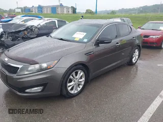 2013 Kia Optima EX z VIN 5XXGN4A79DG181719, wystawiony jako IAAI lot #42372478 z przebiegiem 166 410 mil mil oraz . Historia ofert i sprzedaży dostępna na DreamBid. Obrazek 17.