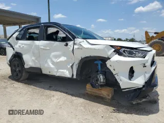 2021 Toyota RAV4 Hybrid XSE with VIN 4T3E6RFV3MU061808, listed as a Copart auction lot 57048025 with 20,614 mi miles and Salvage title. Bid and sale history available at DreamBid. Image 4.