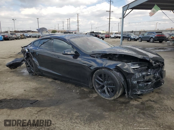 2023 Tesla Model S Plaid z VIN 5YJSA1E63PF498778, wystawiony jako Copart lot #43960765 z przebiegiem Nie podano mil oraz Szkoda całkowita • Salvage title. Historia ofert i sprzedaży dostępna na DreamBid. Obrazek 4.