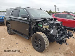 2017 Chevrolet Tahoe LT with VIN 1GNSKBKCXHR388181, listed as a IAAI auction lot 41936609 with 94,783 mi miles and . Bid and sale history available at DreamBid. Image 1.