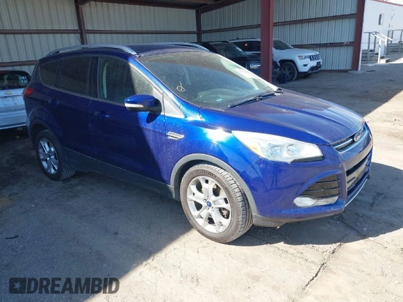 2016 Ford Escape Titanium with VIN 1FMCU9JXXGUB58961, listed as a IAAI auction lot 41772977 with 122,665 mi miles. Bid and sale history available at carsss.com. Image 1.