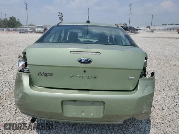 2008 Ford Focus SE z VIN 1FAHP33NX8W141079, wystawiony jako Copart lot #59759325 z przebiegiem 71 522 mil mil oraz Szkoda całkowita • Salvage title. Historia ofert i sprzedaży dostępna na DreamBid. Obrazek 6.